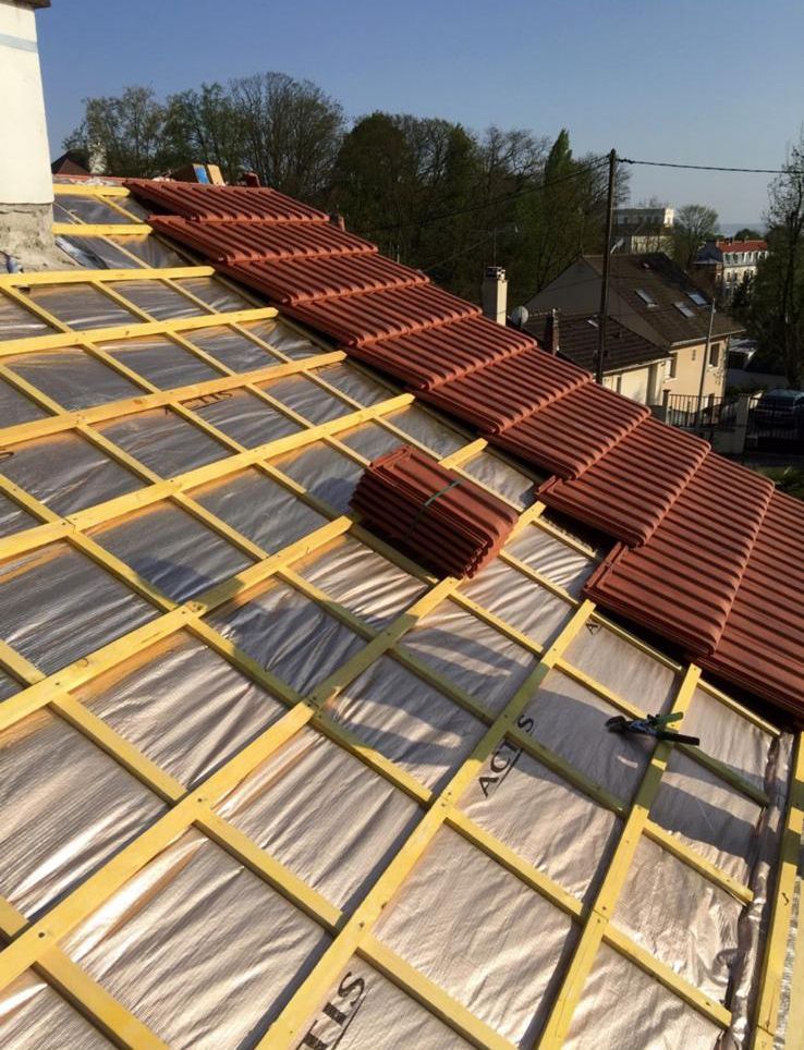 Installation de tuiles sur une toiture