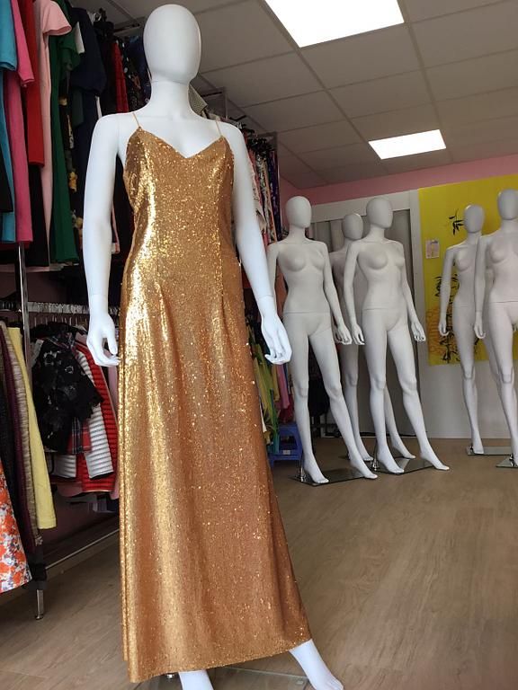 Robe de soirée blanche avec haut brodé 