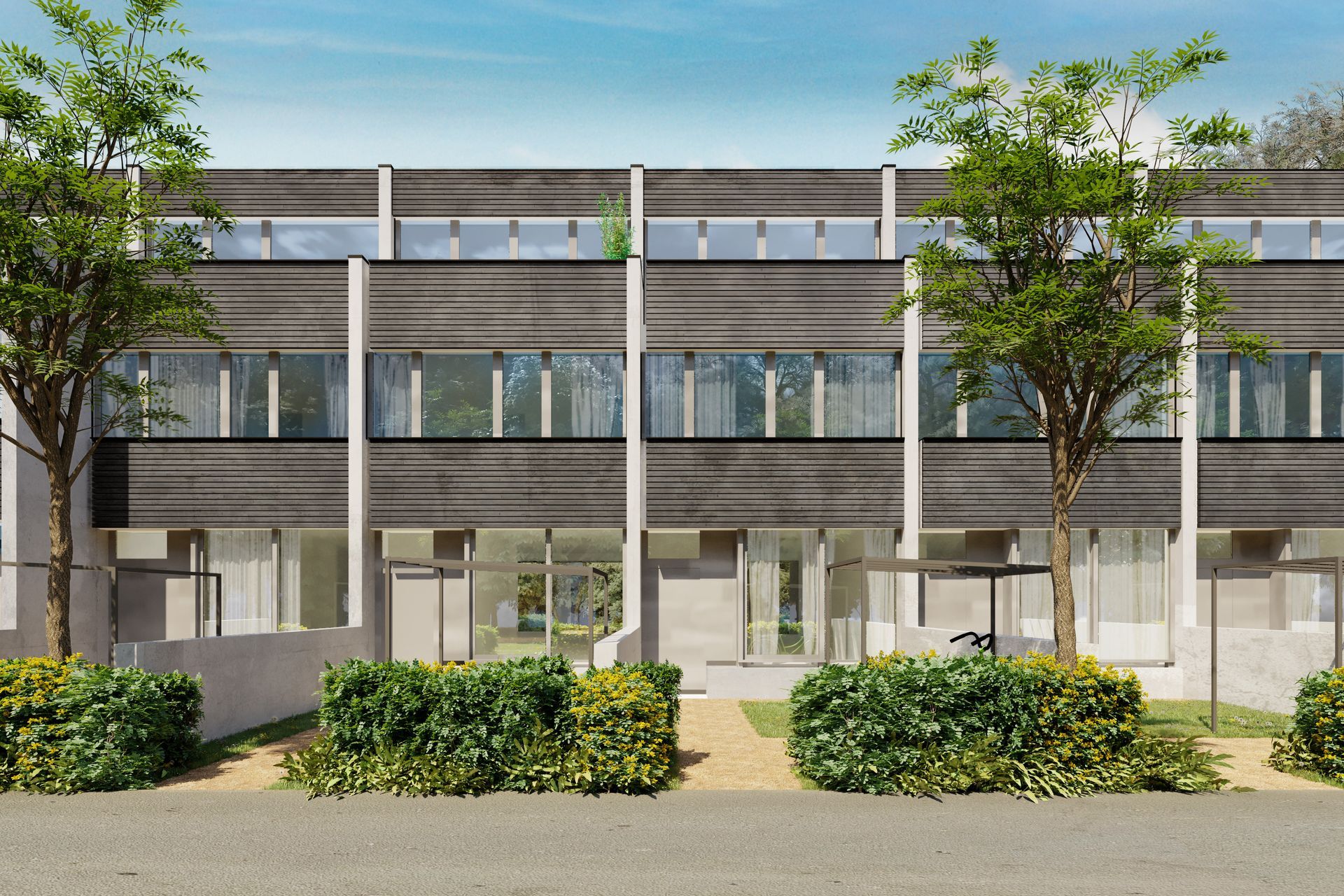 Eine Reihe moderner Stadthäuser mit dunkler Holzverkleidung, Betonelementen und kleinen, durch junge Bäume voneinander getrennten Vorgärten.