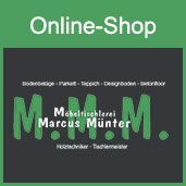 Ein grün-schwarzes Schild mit der Aufschrift „Online-Shop Marcus Münster“.