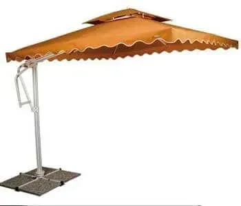 Um grande guarda-chuva está sobre uma base de concreto sobre um fundo branco.