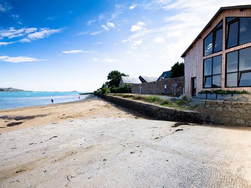 Maison donnant sur une plage