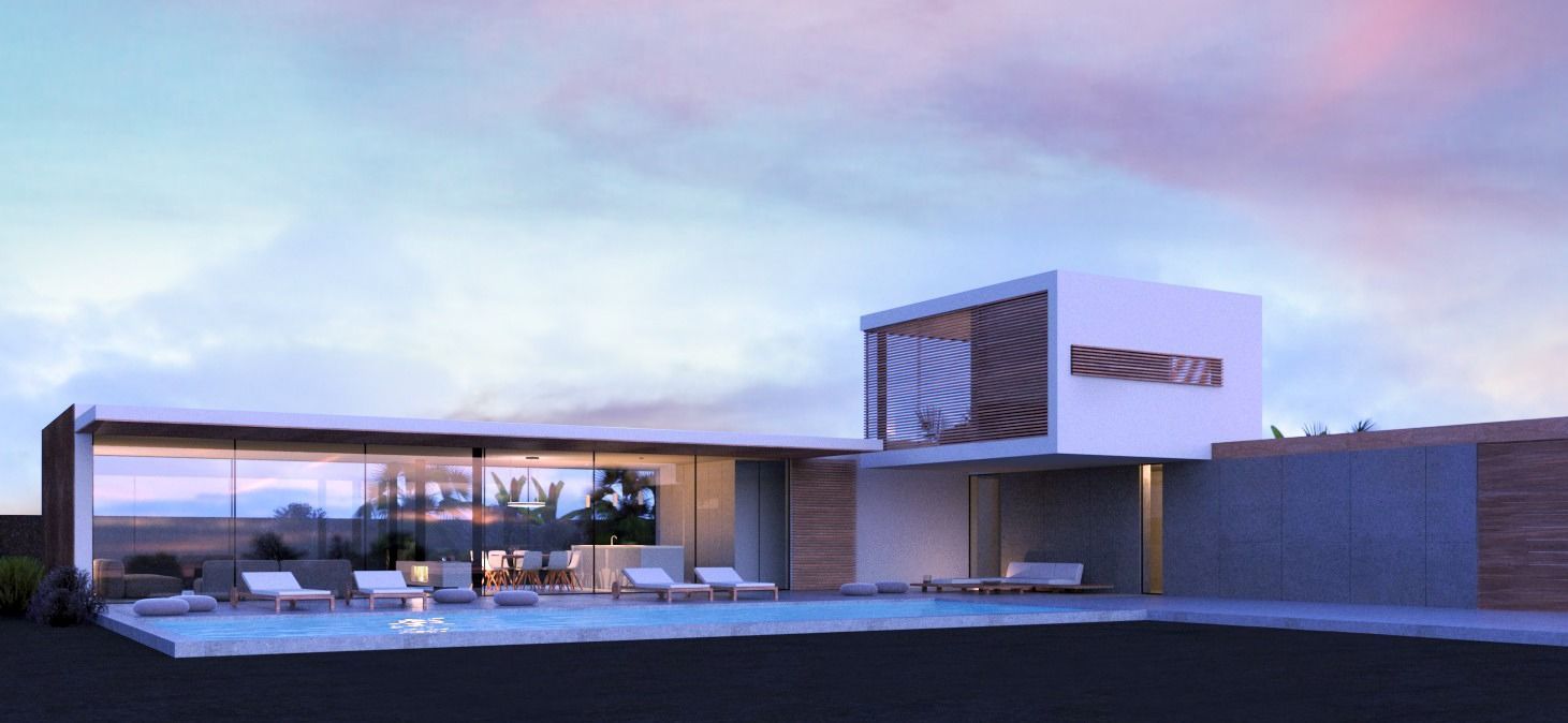 Casa blanca moderna con piscina, paredes de cristal y un atardecer. Hay tumbonas alrededor de la piscina.