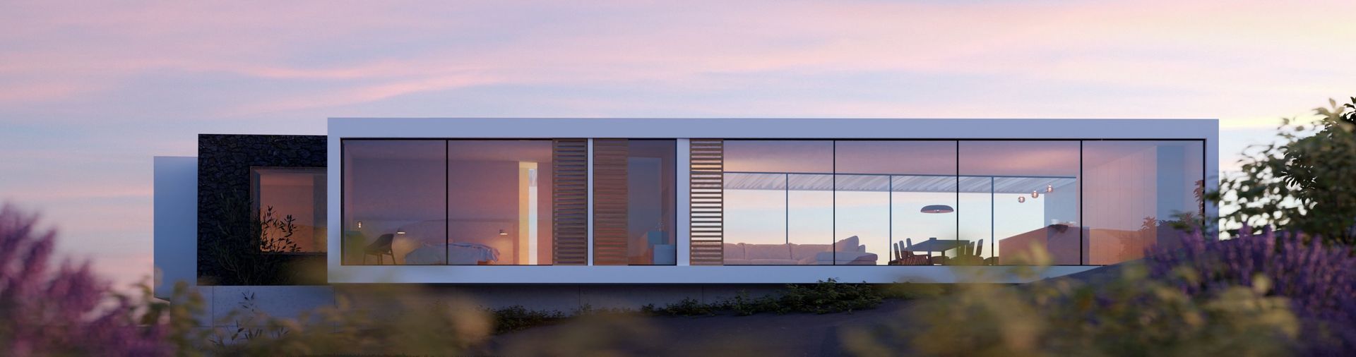 Casa moderna con grandes ventanales y techo plano, situada entre el follaje bajo un cielo oscuro.
