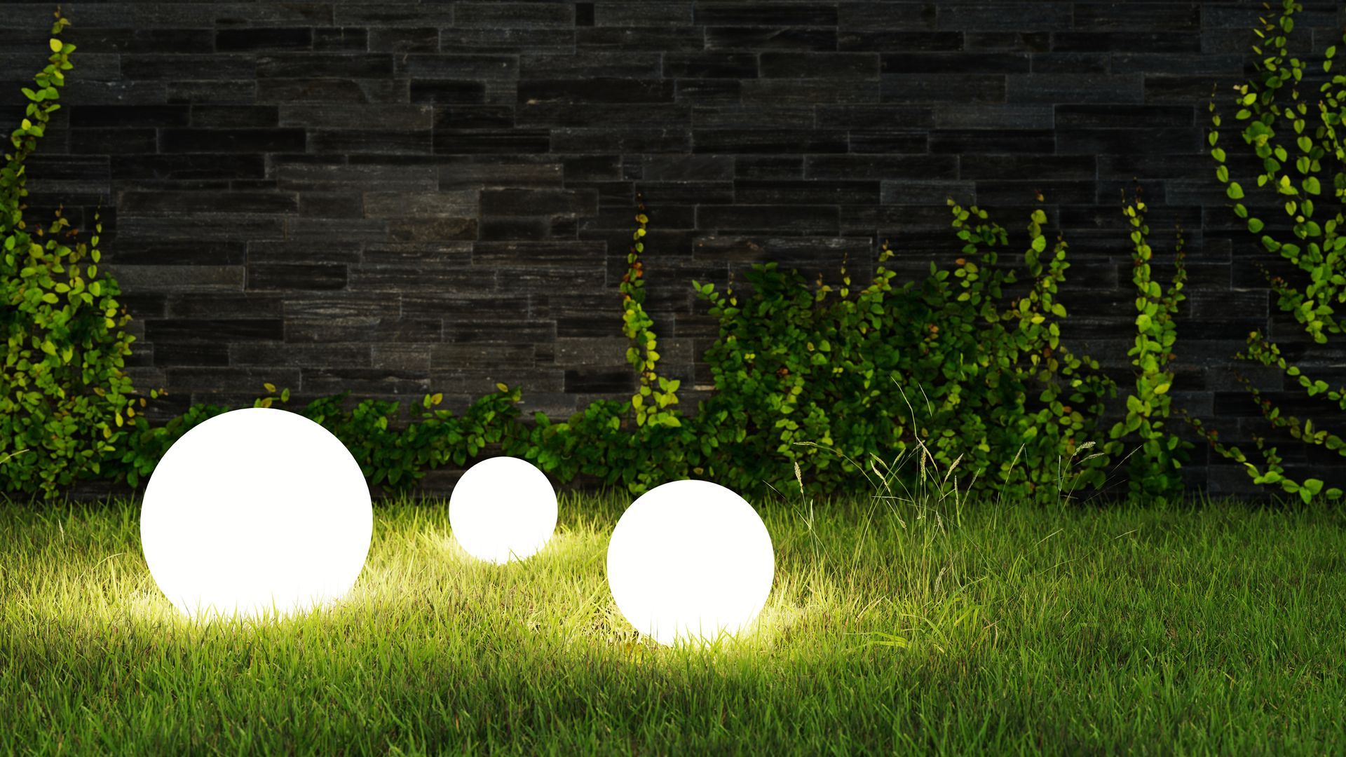 Focus sur trois boules blanches lumineuses éclairant le jardin