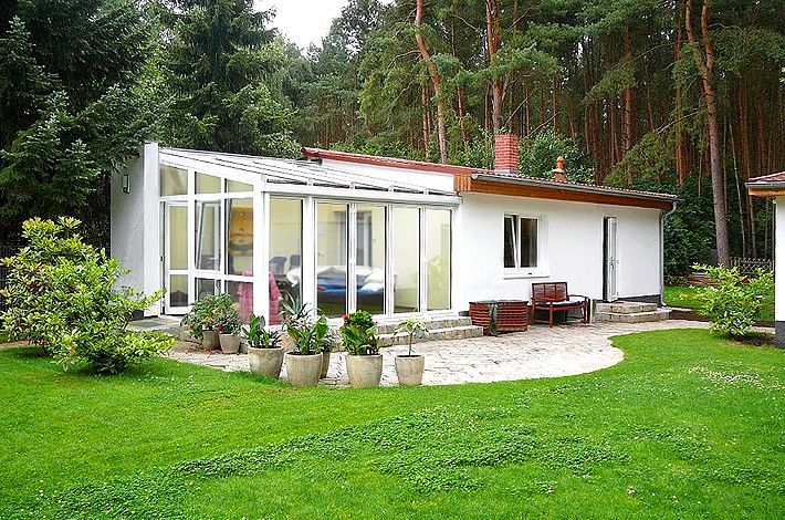 Bungalow mit Glasvorbau