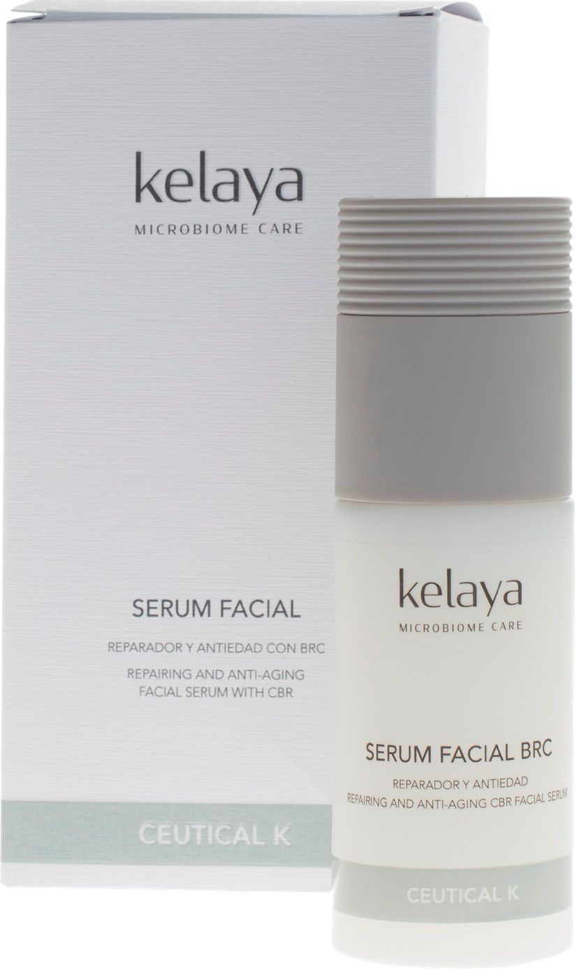 Un frasco blanco de sérum facial Kelaya y su caja a juego, ambos con detalles en gris y texto en negro.