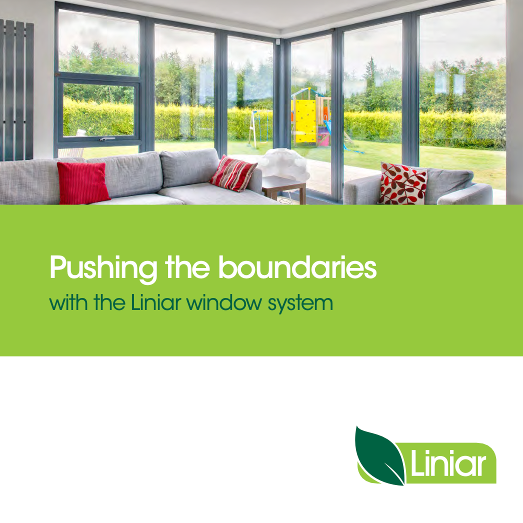 A living room with a lot of windows and the words pushing the boundaries with the liniar window system