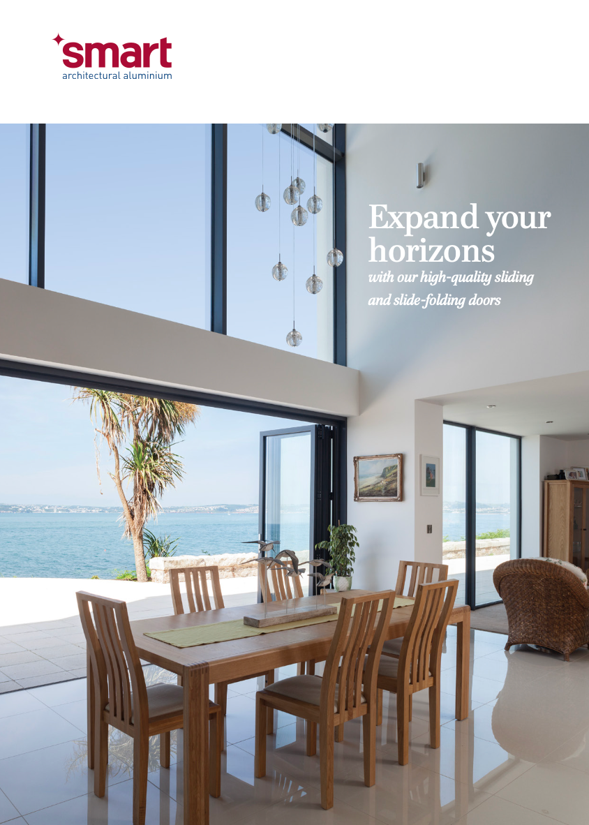 A brochure for smart windows shows a dining room with a table and chairs and a view of the ocean.