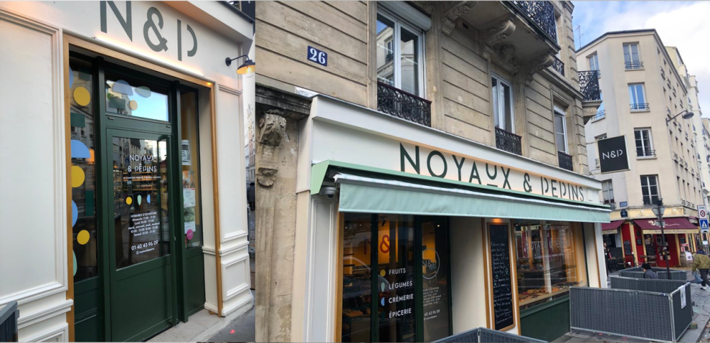 Vue sur rue de la devanture du restaurant Noyan, dans une rue de style parisien