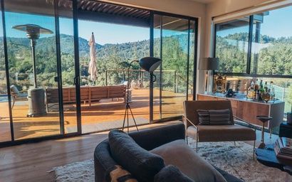 A view of the living room to the patio of Modisita House Rental