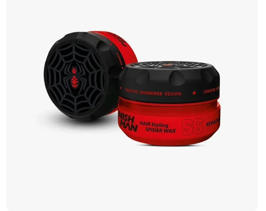 Latas cilíndricas de bálsamo labial negras y rojas con un estampado de telaraña, mostradas sobre un fondo blanco.