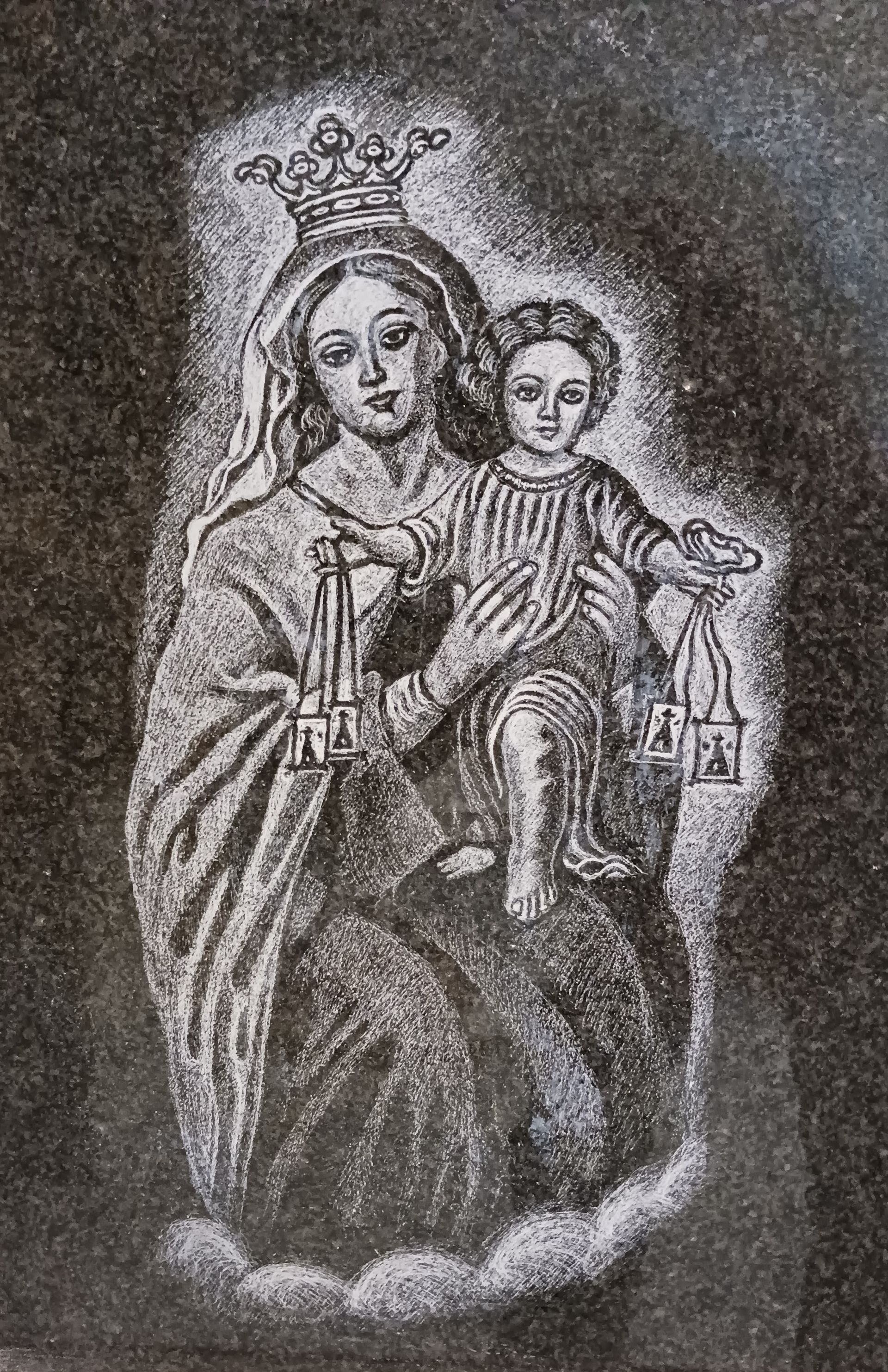 Un dibujo en blanco y negro de una mujer sosteniendo al Niño Jesús.