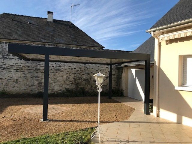 Carport devant garage