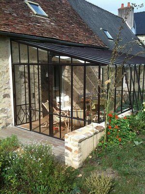 Véranda en verre et acier