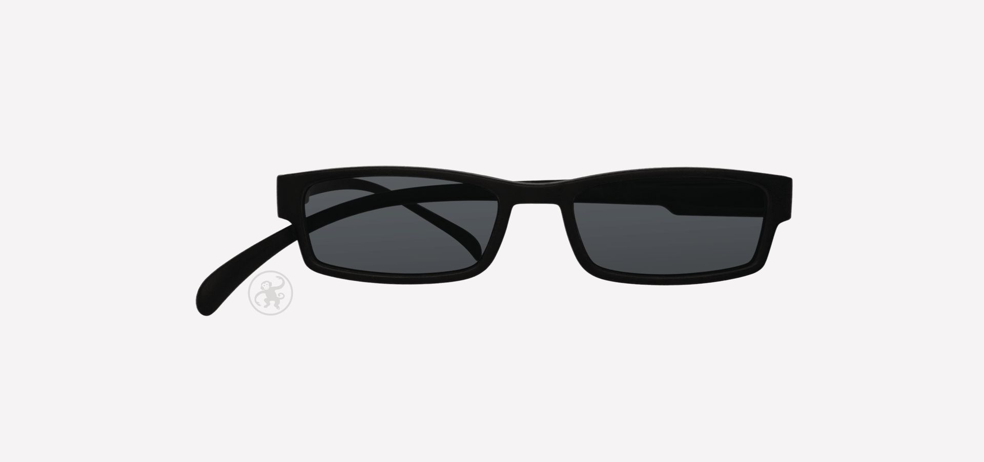 Eine schwarze Sonnenlesebrille auf weißem Hintergrund.