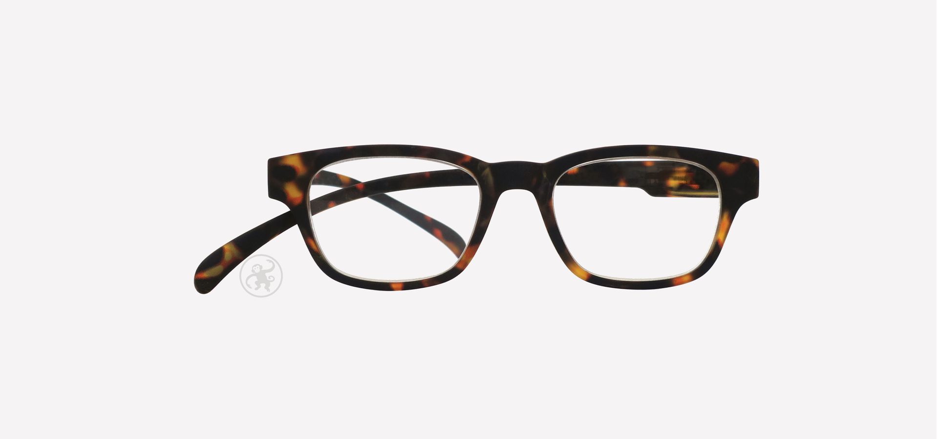 Eine havanna farbene Brille auf weißem Hintergrund.