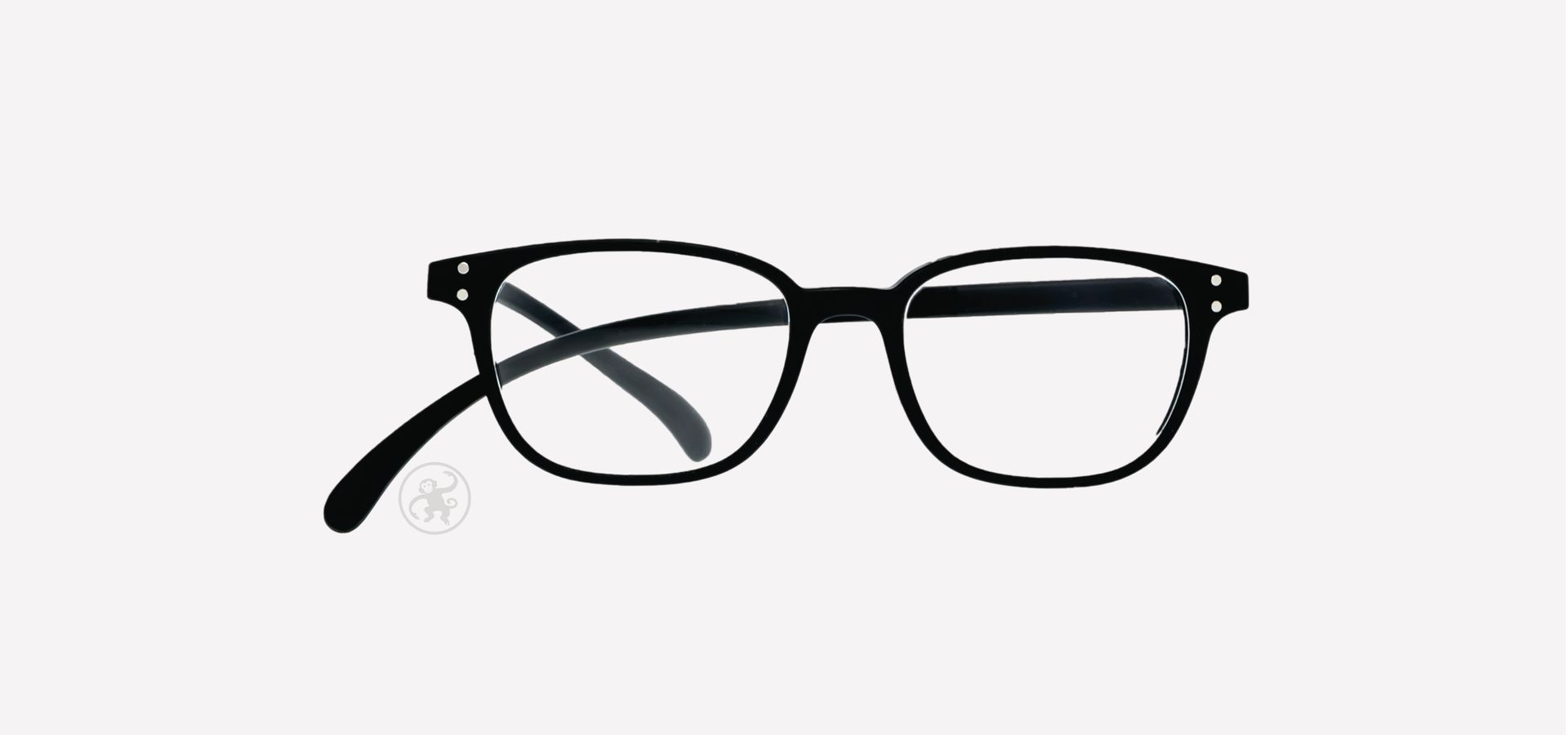 Schwarze Lesebrille von vorne auf hellem Hintergrund