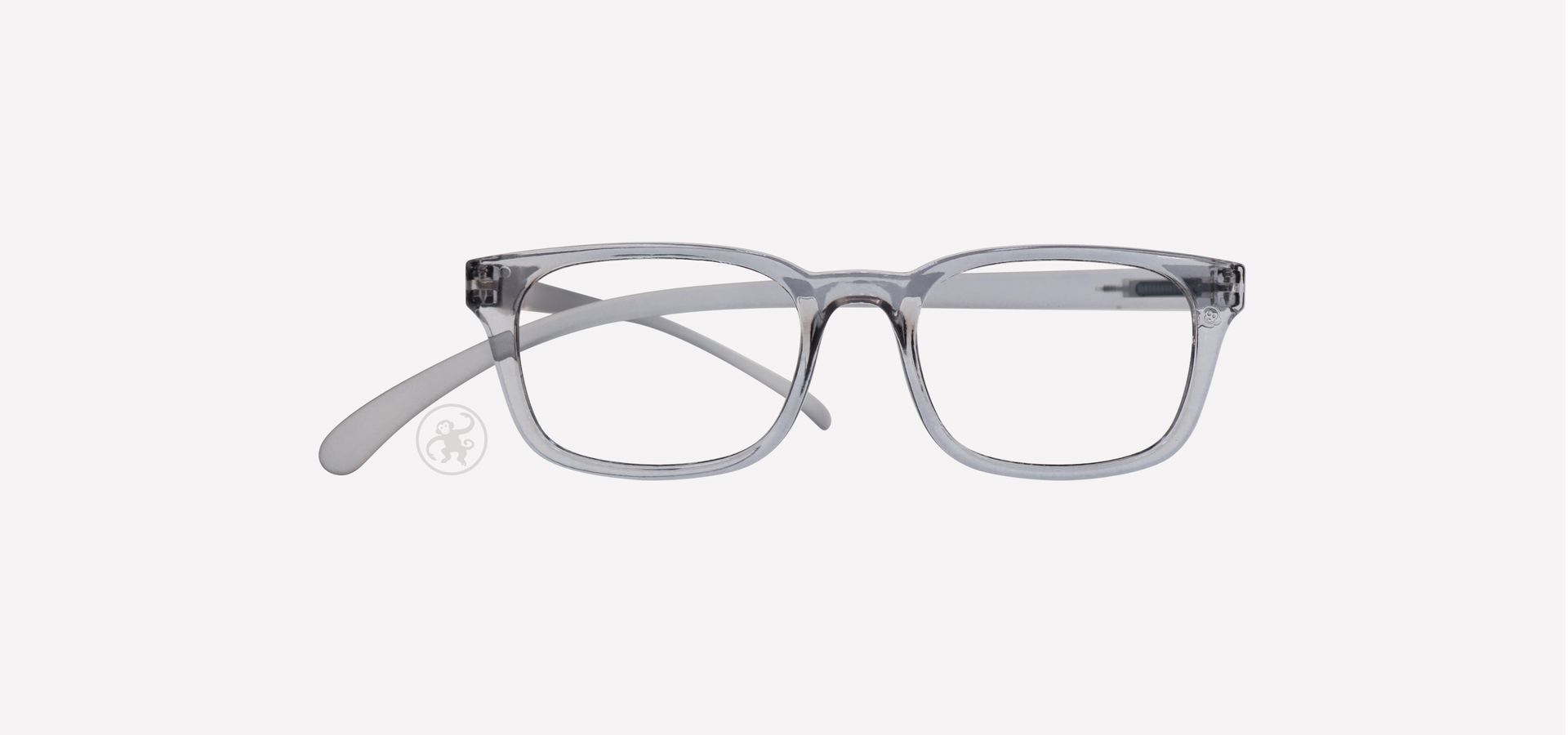 Eine grau transparente Brille auf weißem Hintergrund.