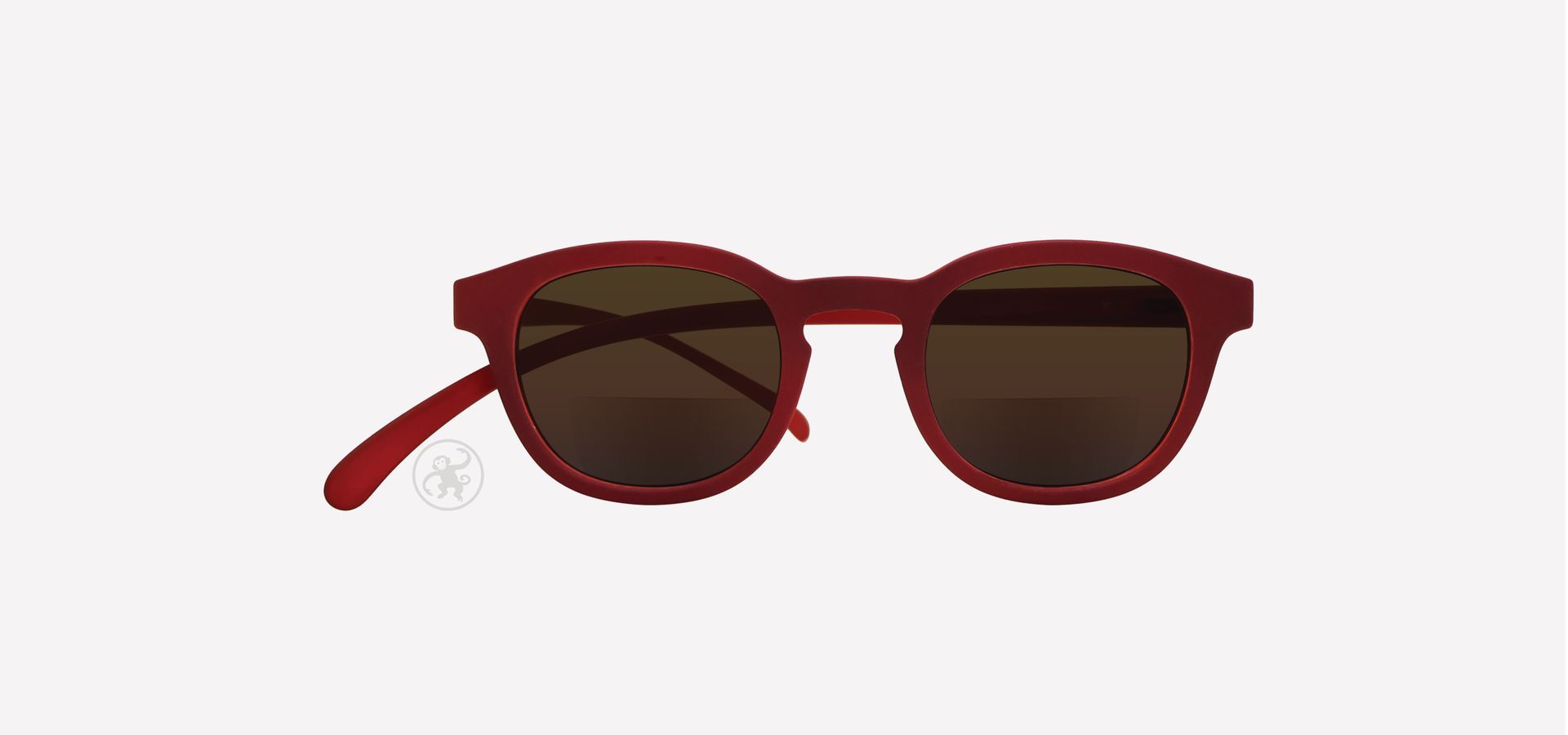 Rote Bifokal-Lesesonnenbrille von vorne auf hellem Hintergrund