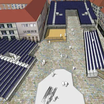 Eine Luftaufnahme eines städtischen Platzes mit gestuften blauen Sitzplätzen, Fußgängern und Gebäuden mit roten Dächern.