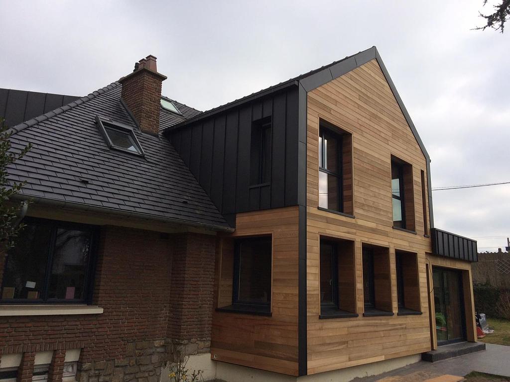 Couverture en tuiles : maison en bois