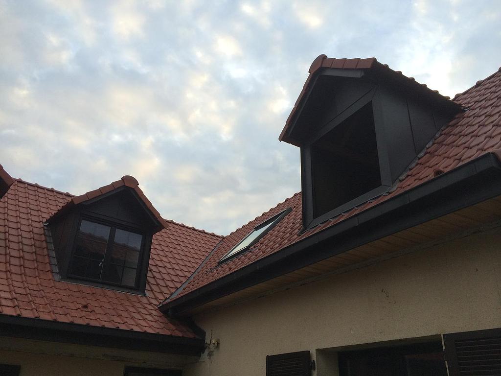 Couverture de toit en tuiles par notre équipe