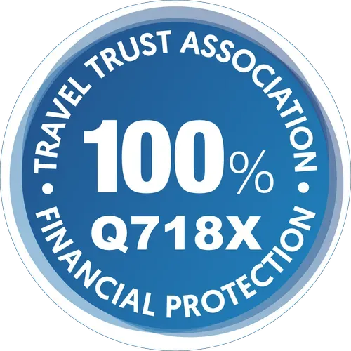 Blue circular Travel Trust Association financial protection badge with “100%” and code “Q718X”
