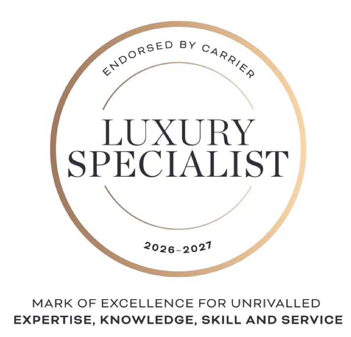 Luxury Specialist award badge with gold ring and black serif text, marked endorsed by Carrier.