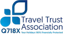 Travel Trust Association logo with blue icon and text, plus Q718X and “Your Holidays 100% Financially Protected”