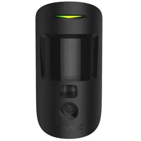 Détecteur de mouvement Ajax blanc sur un mur rouge.