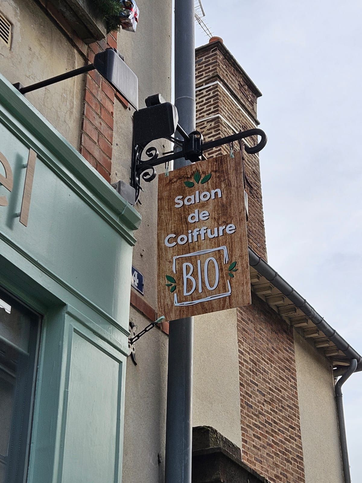 Enseigne extérieure imitation bois