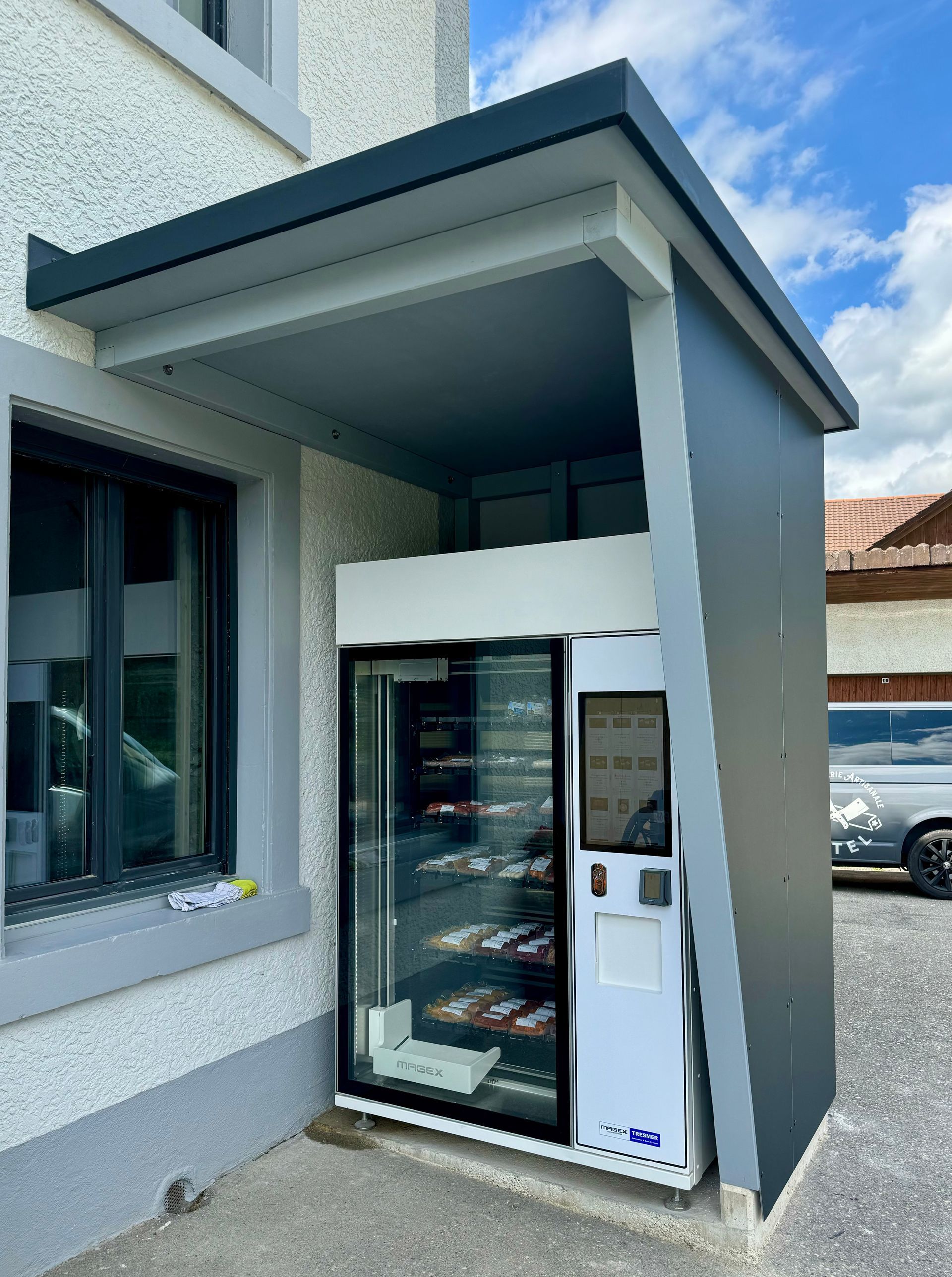 Travaux de charpente: conception d'abris pour selecta par Nikles Toiture SA