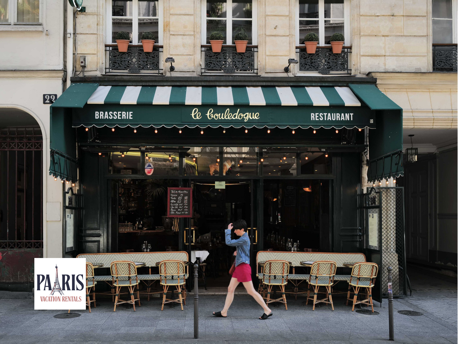 Woman Walking past Restaurant in Paris