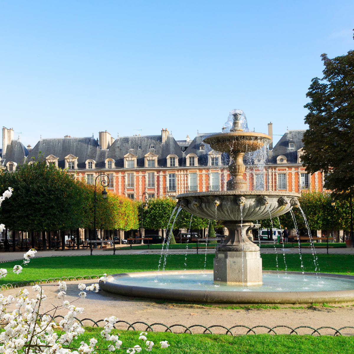 Woman wearing headset at desk with computer, Eiffel Tower art in background.