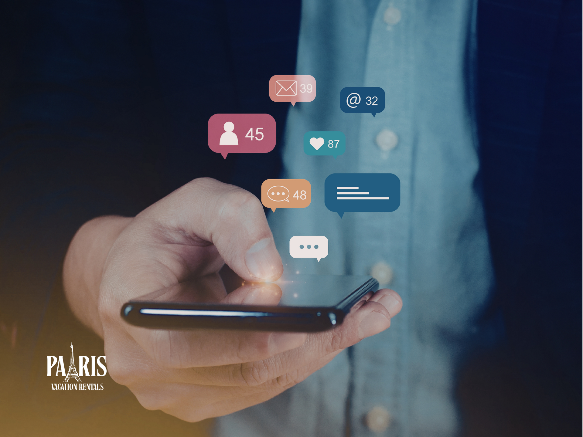 Hand holding smartphone with social media notifications