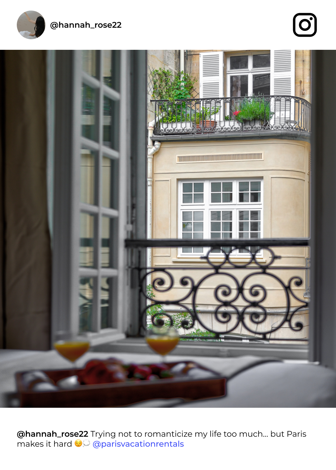 Window view with balcony and breakfast tray.