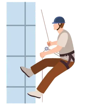 Un hombre está escalando un edificio con una cuerda.