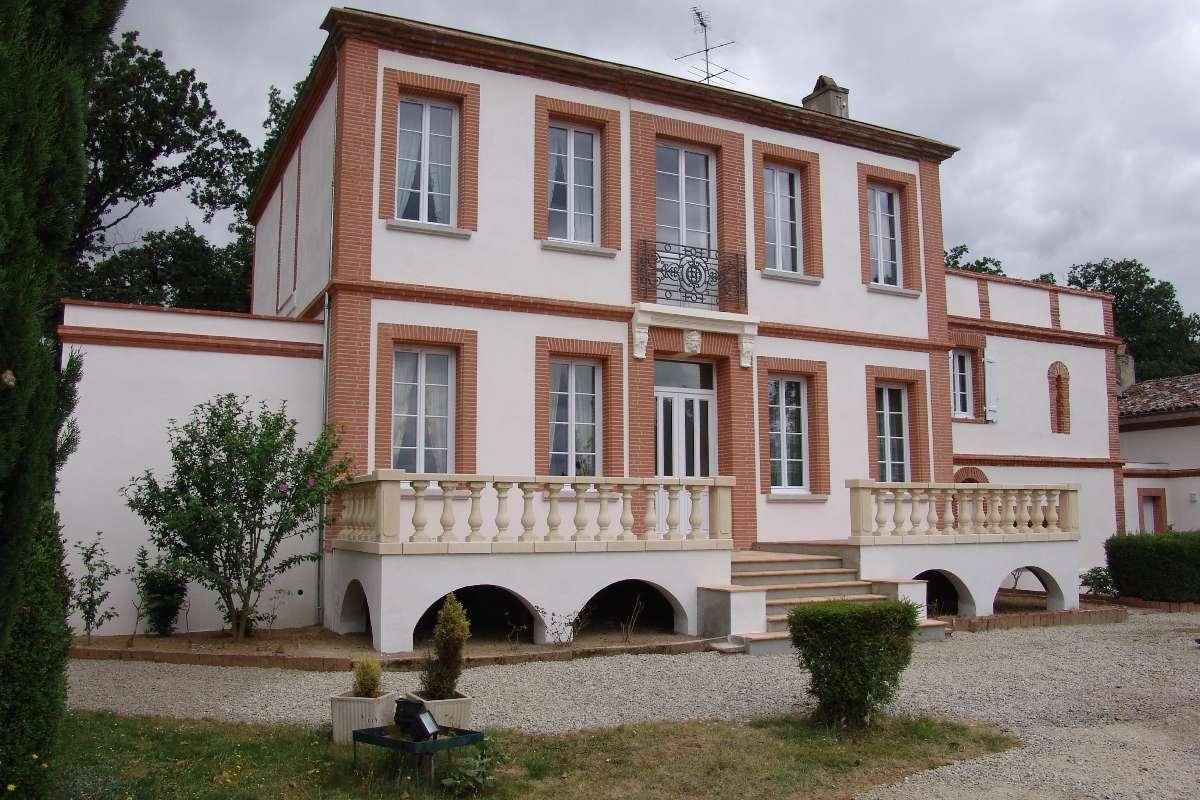 Rénovation façade maison ancienne après