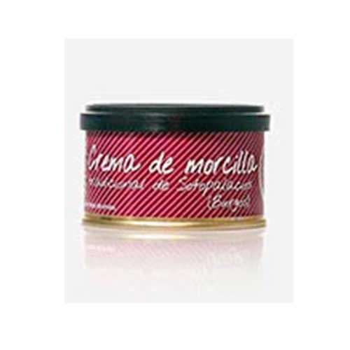 Una lata de crema de morcilla reposa sobre una superficie blanca.