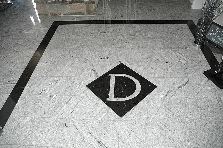 Ein schwarzer Diamant mit dem Buchstaben d darauf