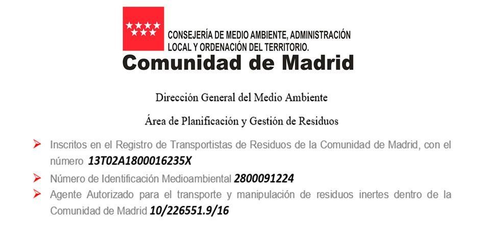 Un cartel rojo y blanco que dice Comunidad de Madrid.