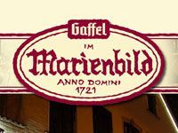 Ein Logo für Marienbild anno domini 1721 mit einem Gebäudebild im Hintergrund.