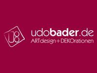 Ein Logo für udobader.de Art Design + Dekorationen auf rotem Hintergrund.