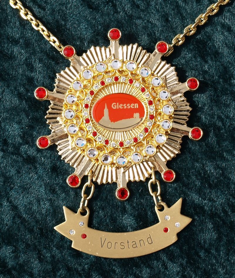 Eine Goldmedaille mit dem Wort „Forstand“ darauf