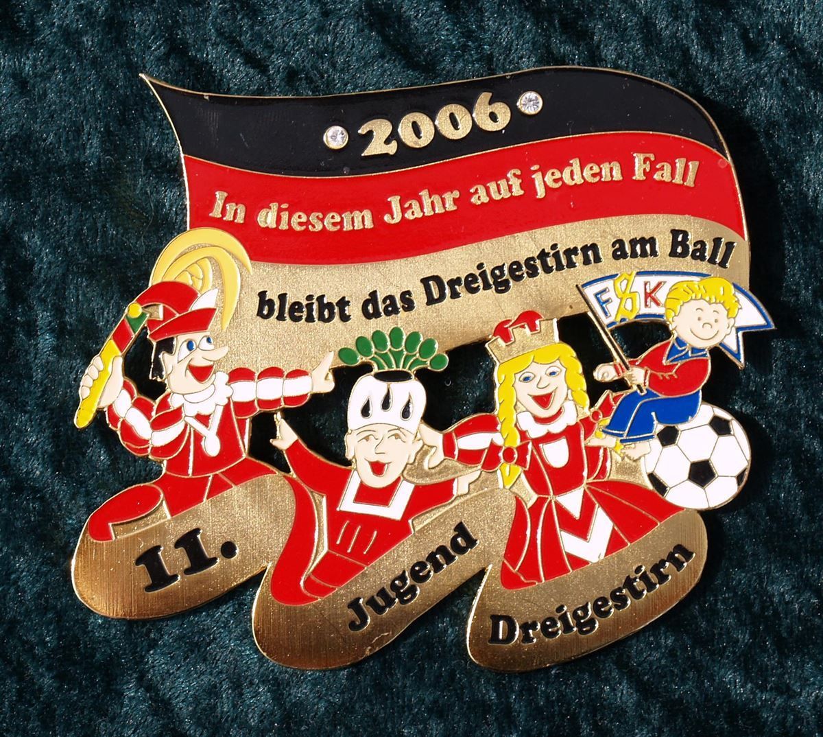 Eine Anstecknadel mit der Aufschrift 2006