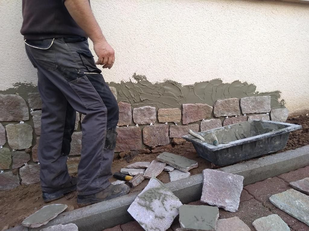 Construction de muret de clôture maçonné