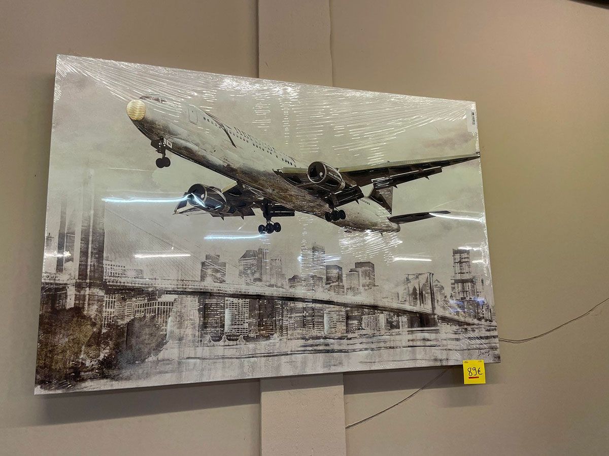 Cadre mural qui montre un avion