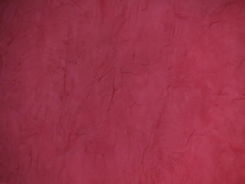 Eine Nahaufnahme eines Stückes rotes Papier.