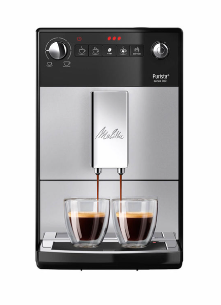 Eine Kaffeemaschine, in die zwei Tassen Kaffee eingefüllt werden.